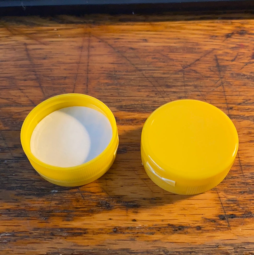 Yellow squeeze bottle caps